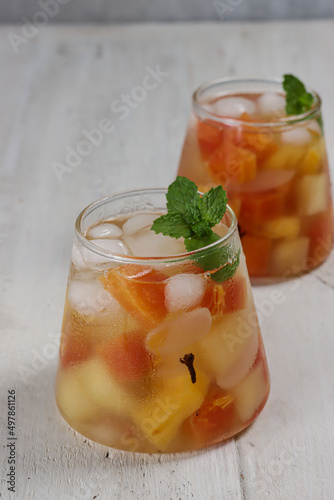 Es Stup or setup buah or ice Mulled fruits Drink, made of fruits, honey or brown sugar, cloves and cinnamon.