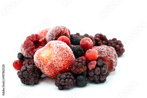 frozen mixed berries isolated on white background