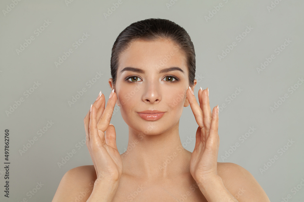Beauty woman with healthy skin and natural makeup. Perfect young face Beauty woman with healthy skin and natural makeup. Perfect young face