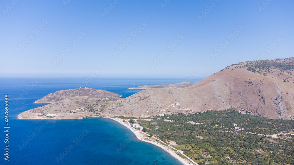 Typical Albanian landscape on the Adriatic shore with mountains. Sunny morning in Albania, Europe. Traveling concept background.