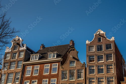Amsterdam, Netherlands, April 2022. Historic facades along the canals of Amsterdam.