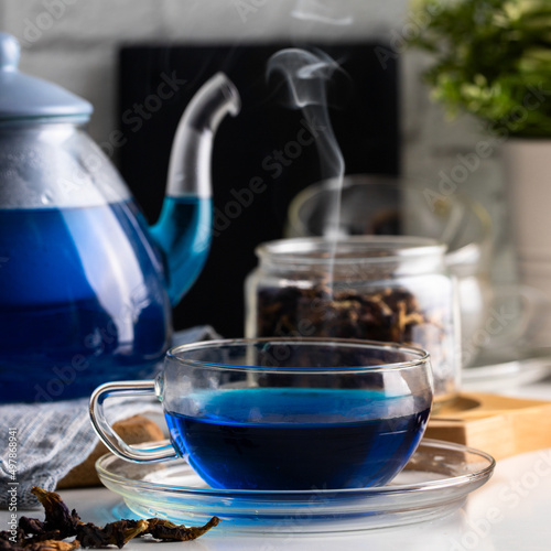 Butterfly pea flower tea in the kitchen. Caffeine free herbal beverage has anti-oxidant and an anti-aging effect.