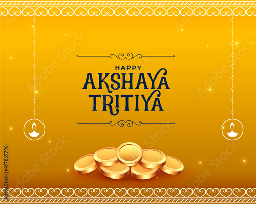 akshaya tritiya golden card with golden coins photo