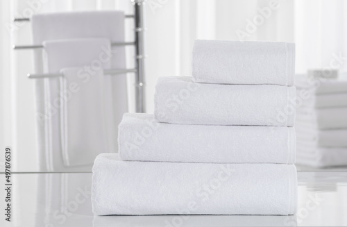 White towel shower in bathroom