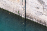 River water level meter in Torino, Italy, Po river, drought concept