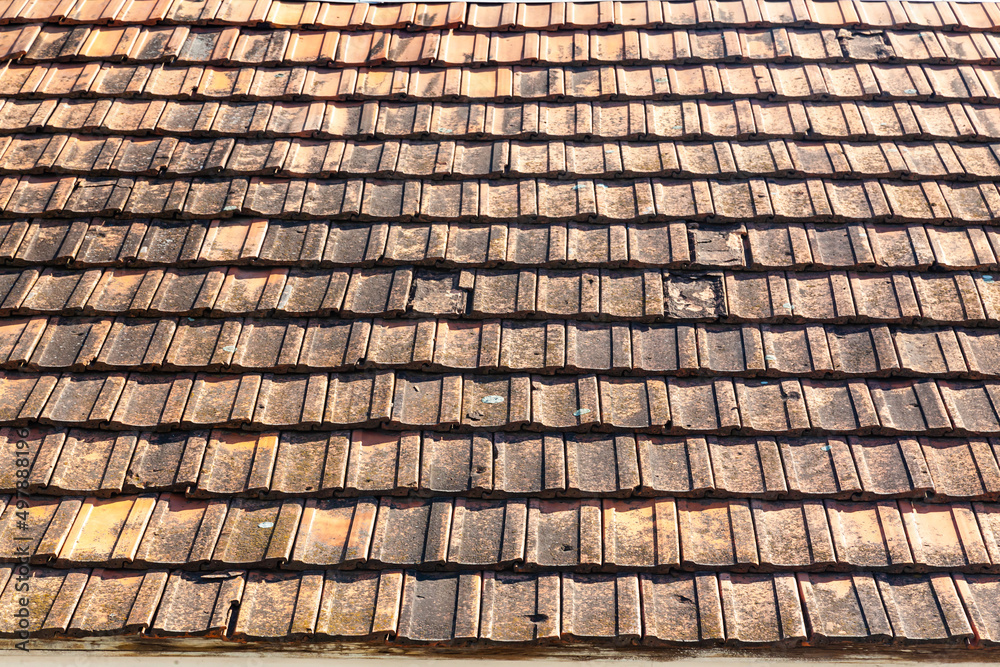 The roof of a private house made of natural ceramic tiles. The roof of a private house made of natural ceramic tiles.