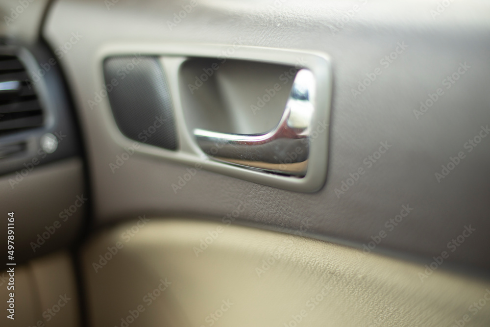 Interior of car. Machine from inside. Interior of car. Panels and handles in transport.