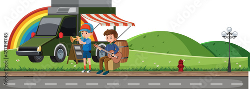 Boys playing guitar in the park