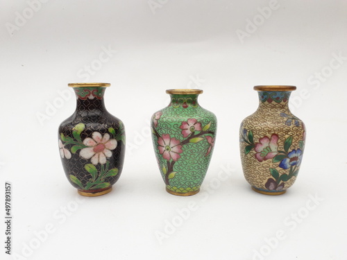 Vintage enameled copper vases from China with flower patterns