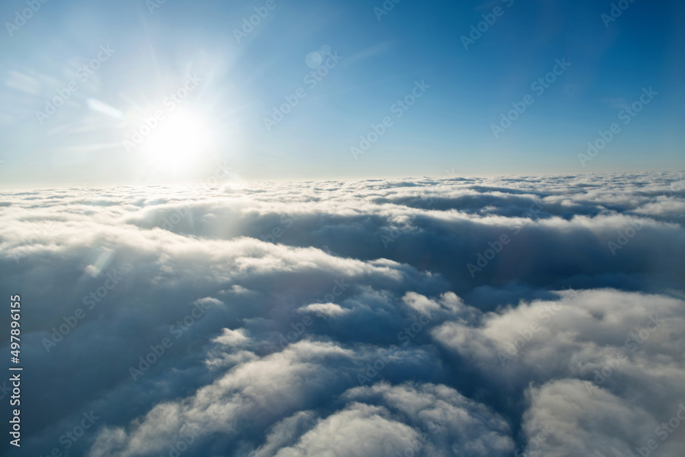 Naklejka premium Fluffy white clouds from above