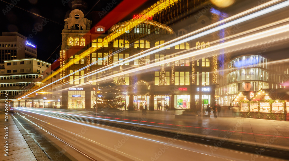 Tram in front of the shopping center Anger 1 in the german city of Erfurt in Thueringia during the Christmas season