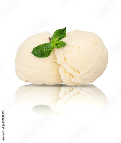 Close-up of two scoop balls vanilla ice cream with mint leaves isolated on white. Homemade ice cream