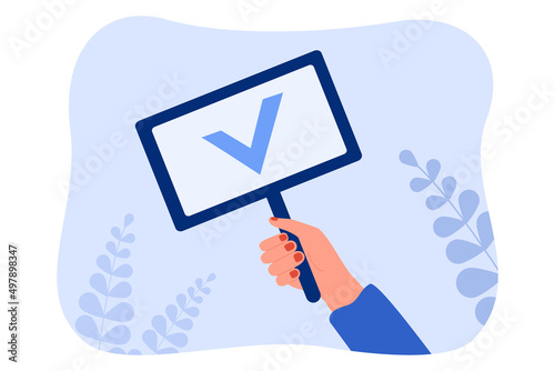 Human hand holding checkmark sign on board with stick. Positive answer to test or survey of person with tick on signboard flat vector illustration. Satisfaction, ratification, approved vote concept