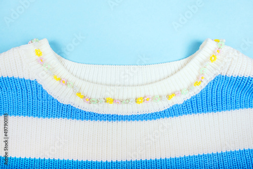 Summer fashion flatlay with top and beaded necklace