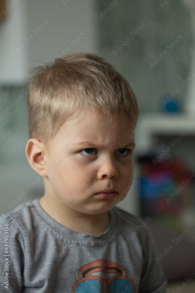 little boy frowning little boy frowning
