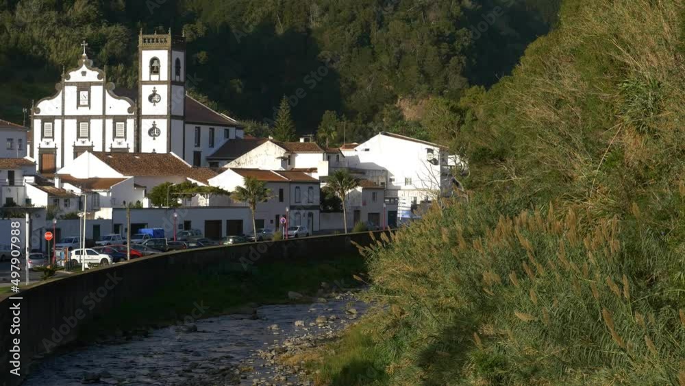 The town of Povoacao in the Azores. General view. Along the river The town of Povoacao in the Azores. General view. Along the river