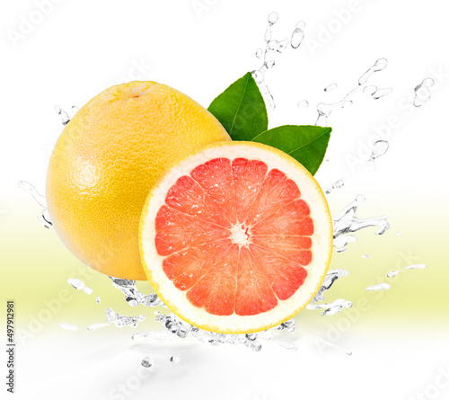 Fresh Grapefruit fruit falling in the air with splash water isolated on white background, Grapefruit on white background With clipping path.