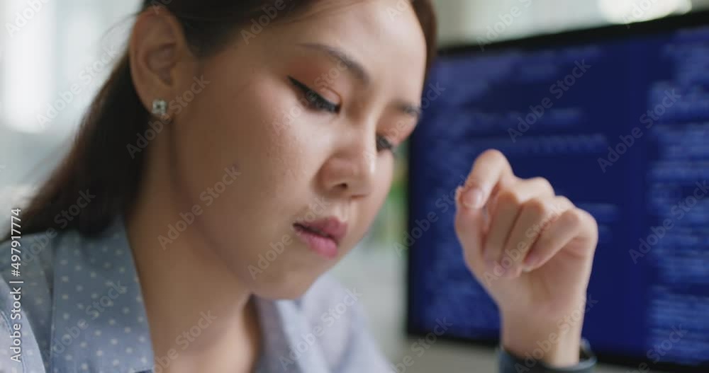 Chronic burnout in software engineer tired solving problem fix bug work hard at home office desk. Coder job for young asian talent woman cloud computing cyber security reskill upskill for workforce.