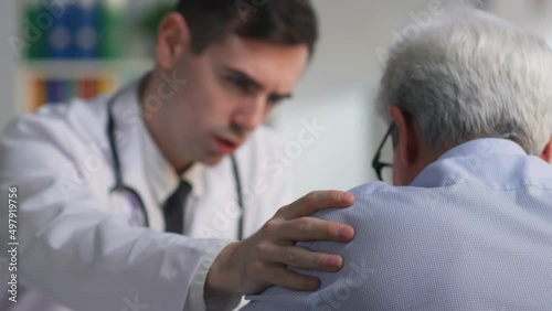 Close up of doctor comfort aged patient with incurable disease diagnosis