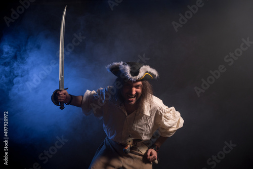Quadro em tela Pirate filibuster sea robber in suit with gun and saber