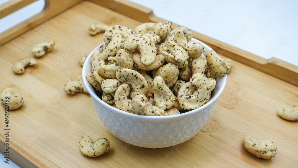 Cashew nuts. Roasted Flavored Cashews or kaju. Cashews are rich in