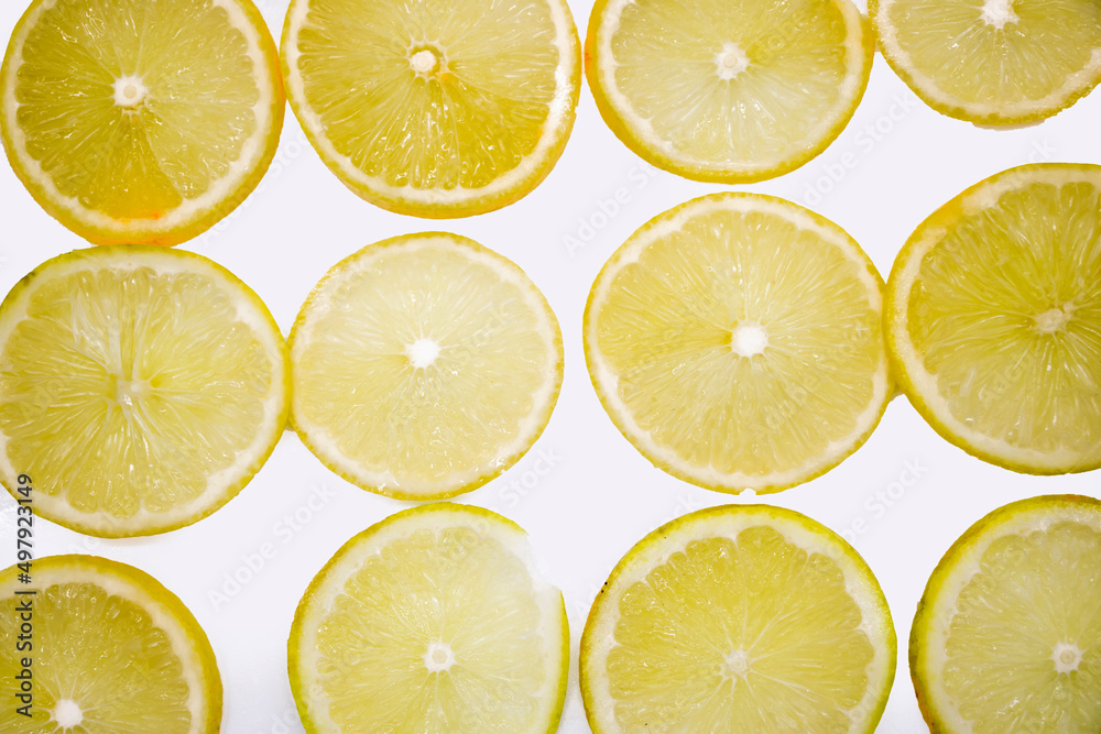 lemon slice design on white, top view,selective focus