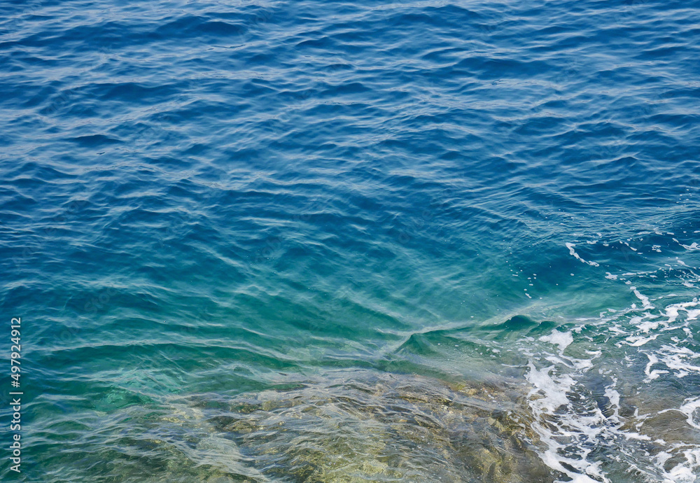 Crystal clear sea water on the Ligurian coast in Italy Crystal clear sea water on the Ligurian coast in Italy
