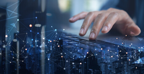 Digital technology concept, internet network connection. Computer programmer working on laptop computer and smart city, data link, software development