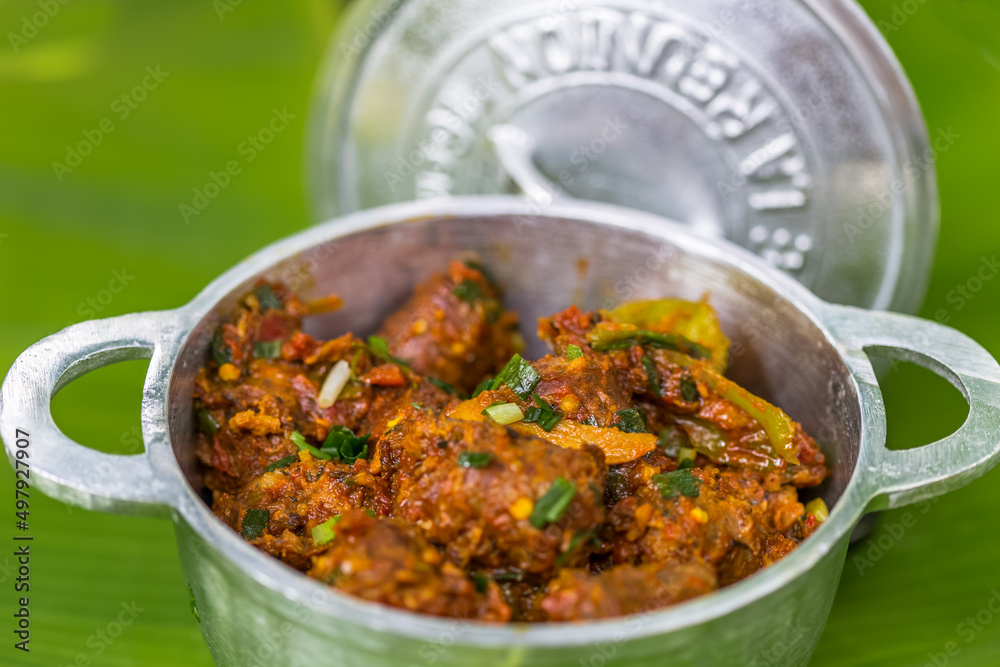 Rougail de saucisses, spécialité culinaire emblématique réunionnaise Rougail de saucisses, spécialité culinaire emblématique réunionnaise