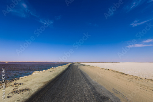 Close up View to the Road in the middle of Salt Lake Aftanas in Siwa Oasis, Egypt