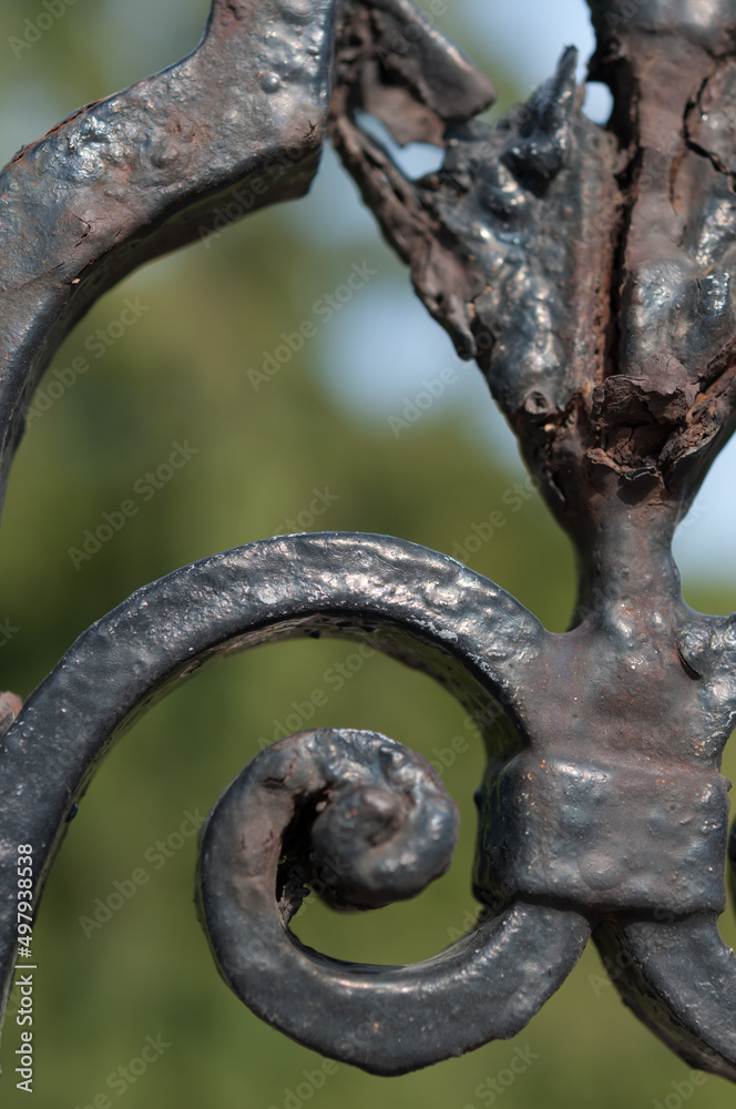 rusty, decaying wrought iron metal work close up rusty, decaying wrought iron metal work close up