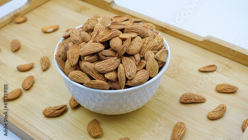 Different Types of Mamra and Afghani Badam. Almond nuts or Badam. Almonds  are rich in fiber, protein, and healthy fats. Badam is also a  commonly eaten as brain food in India. photo