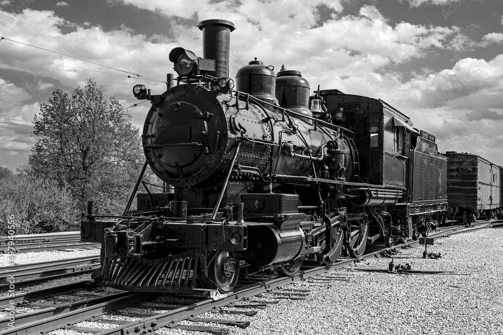 Fototapeta premium Black and white shot if old steam locomotive train engine 