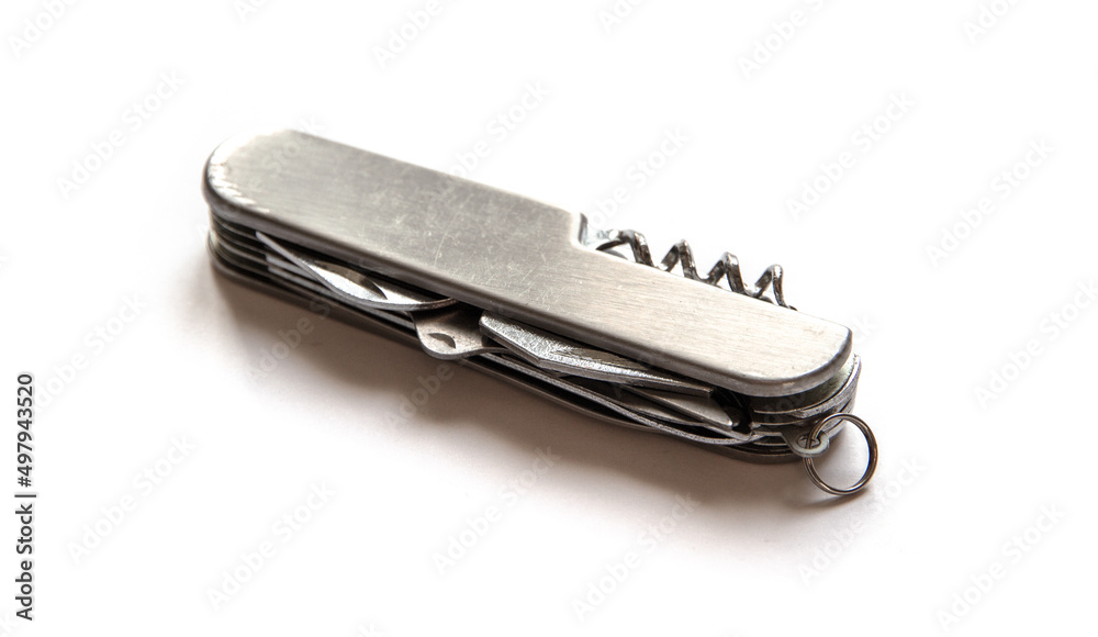 Metallic swiss knife isolated on white Metallic swiss knife isolated on white
