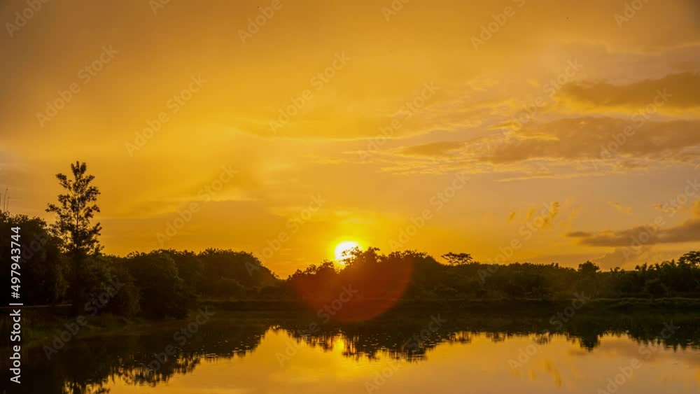 4k Time-lapse, View of Colorful dramatic sky sunset or sunrise with Moving clouds background on River, Time lapse sky with cloud in nature and travel concept. High quality video nature foottage 4k Time-lapse, View of Colorful dramatic sky sunset or sunrise with Moving clouds background on River, Time lapse sky with cloud in nature and travel concept. High quality video nature foottage