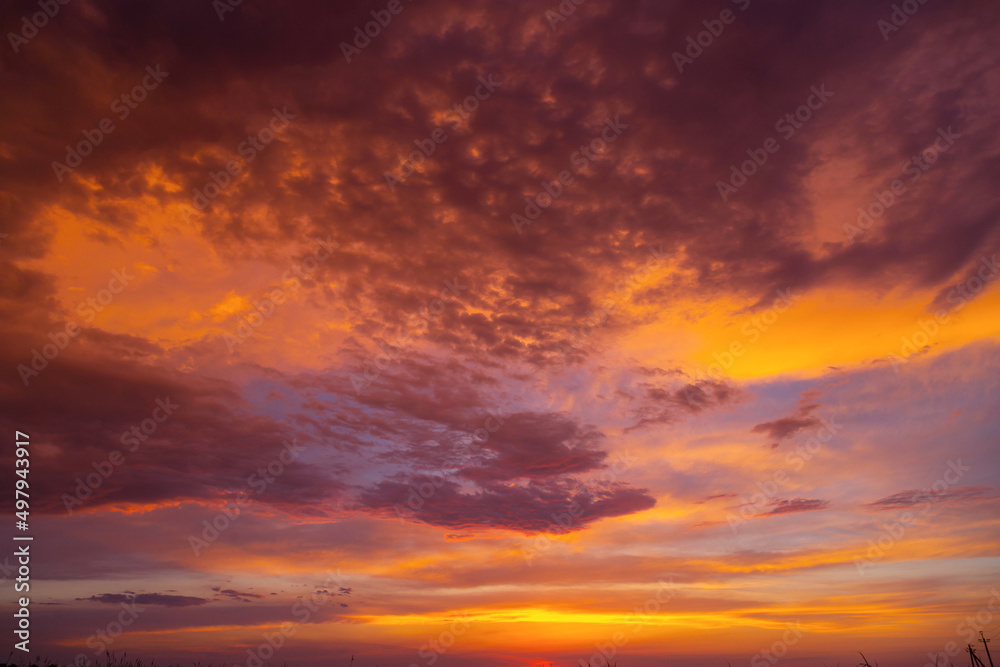 colorful fiery  dramatic red orange sunset dawn cloudy sky