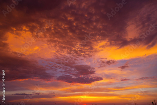 colorful fiery dramatic red orange sunset dawn cloudy sky