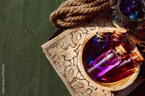 Overhead view of potions and multi-colored dice
