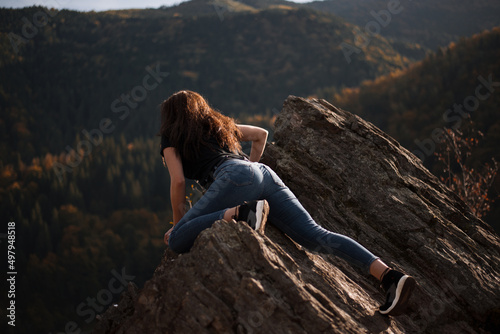 girl sitting on the rock