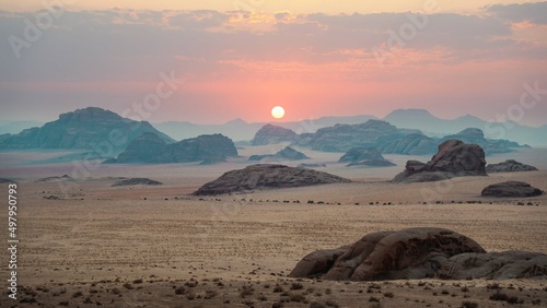 Wadi Rum (Arabic: وادي رم Wādī Ramm, also Wādī al-Ramm), known also as the Valley of the Moon (Arabic: وادي القمر Wādī al-Qamar), is a valley cut into the sandstone and granite rock in southern Jordan