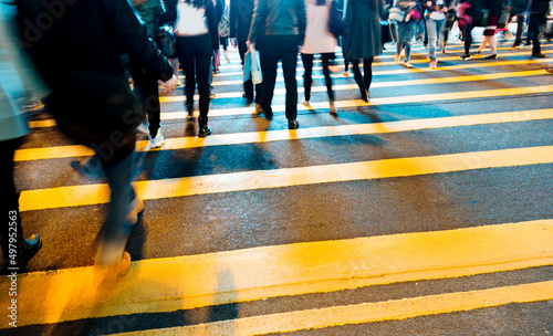 Photography Busy people on zebra crossing street in Hong Kong
