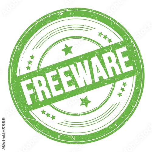 FREEWARE text on green round grungy stamp.