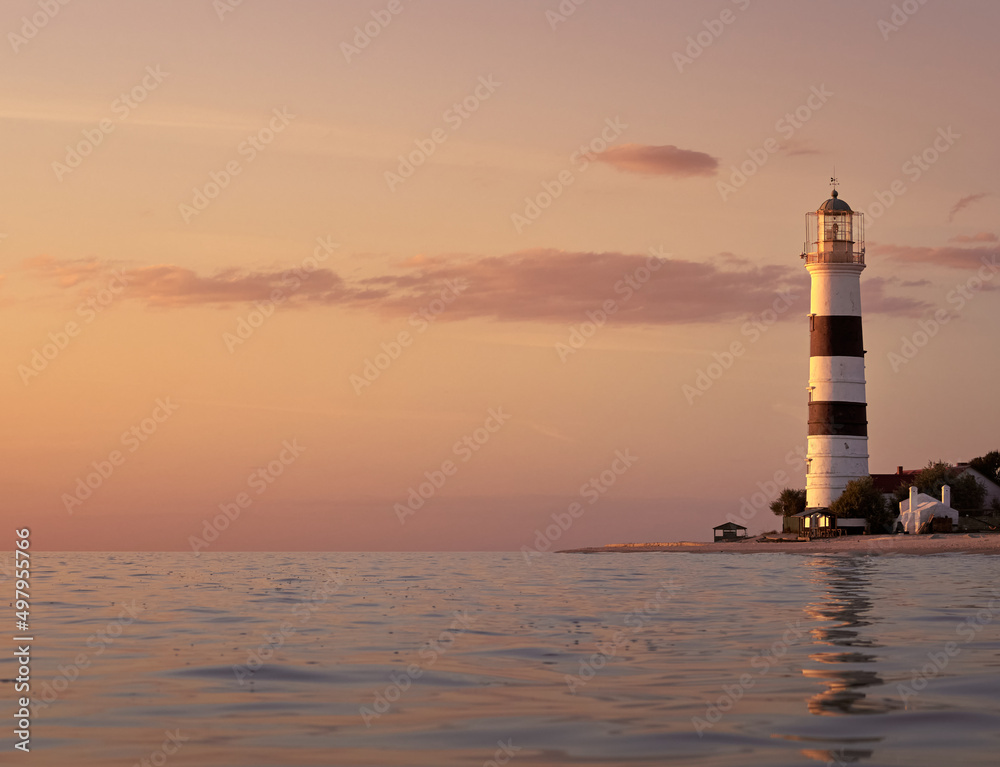 View of a lighthouse. Lighthouse on Tendra Spit, Kherson Oblast, Ukraine.  Copy space.