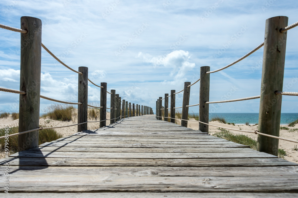 wooden boarwalk on Praia de Cabanas, Portugal wooden boarwalk on Praia de Cabanas, Portugal