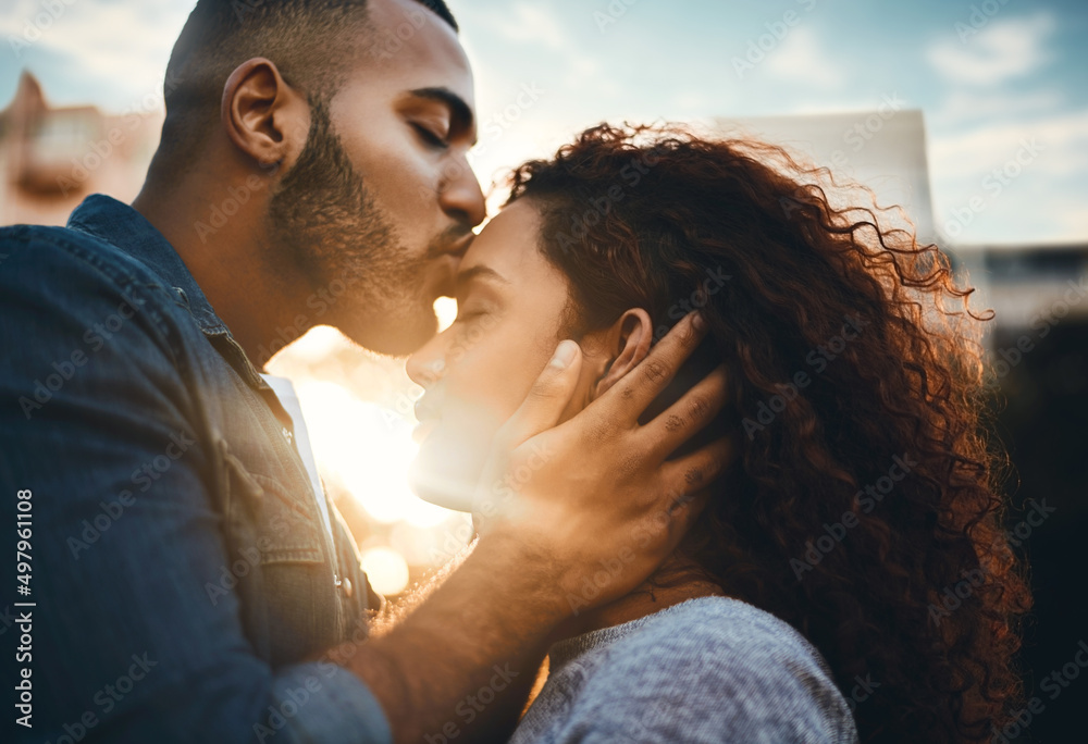 I have all the love in the world for you. Shot of an affectionate young  couple bonding together outdoors. Stock Photo | Adobe Stock