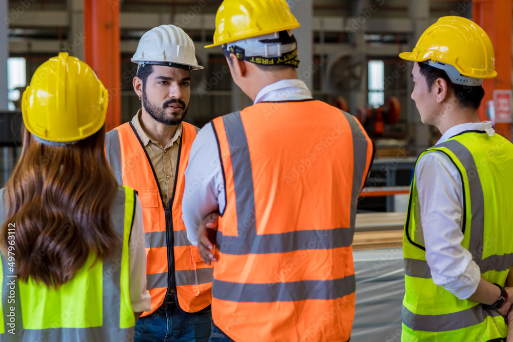 Team Foreman or Team worker work at factory site check up machine or products in site. Team Engineer or Team Technician checking Material or Machine on Plant. Heavy industry factory concept. Team Foreman or Team worker work at factory site check up machine or products in site. Team Engineer or Team Technician checking Material or Machine on Plant. Heavy industry factory concept.
