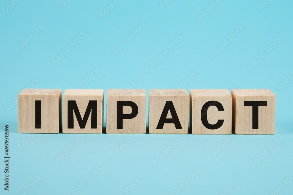 IMPACT word on wood blocks concept. Business improvement, personal development, and growth concept. IMPACT word written on wooden cubes. IMPACT word written on wooden blocks. Business concept. IMPACT word on wood blocks concept. Business improvement, personal development, and growth concept. IMPACT word written on wooden cubes. IMPACT word written on wooden blocks. Business concept.