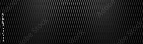 Black metal background. Perforated dark texture with light. Carbon sheet with holes. Abstract steel wallpaper wide. Modern composite material. Vector illustration