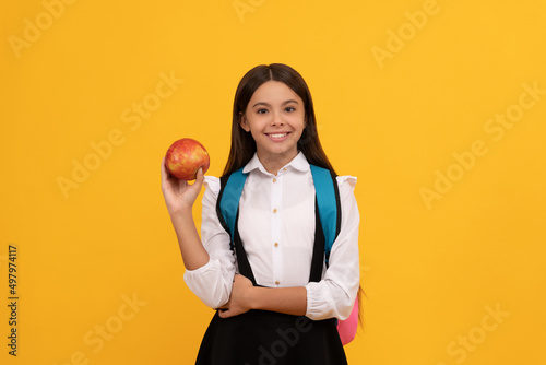 Going back-to-school. Happy child smile holding apple. Back-to-school. September 1