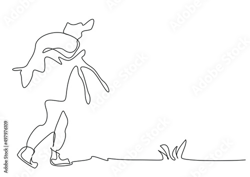 a hunter successfully shoots an animal in nature and walks by catching it and carrying it on his back